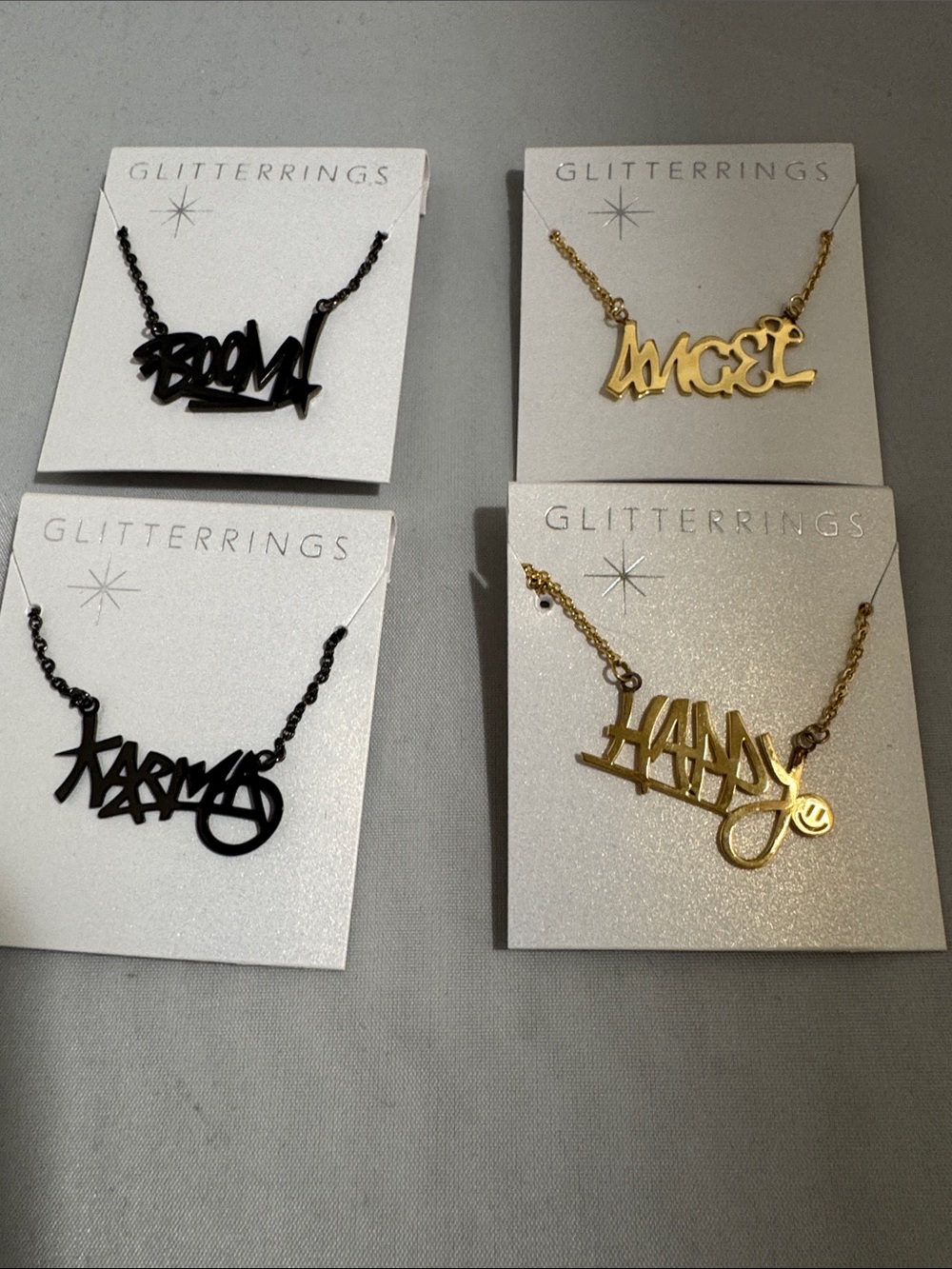 Gold and Black Nameplate Necklace Collection
